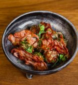 Potato dumplings with truffle-mushroom sauce and bacon chips (200/50/20 g)