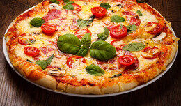 Акция «В обеденное время скидка на все пиццы 15%»