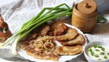 Draniki “Hot off the Skillet” with Bacon, Onion and Sour Cream with greens (320/100/50 g)